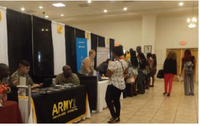 Students line up to talk with army recruiters during the career fair event.