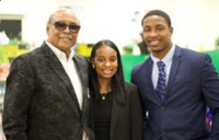 B-CU alumni Harold Lucas, left, joined with Brook Dann and Shaquan Perkins, Miss Mass Communications and Mr. Mass Communications, respectively, at the literacy event at Campbell Middle School. Somer Harris photo.