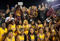 B-CU President Chrite and others hold up nine fingers in celebration of the 9th win over rival FAMU at the 2019 Florida Classic